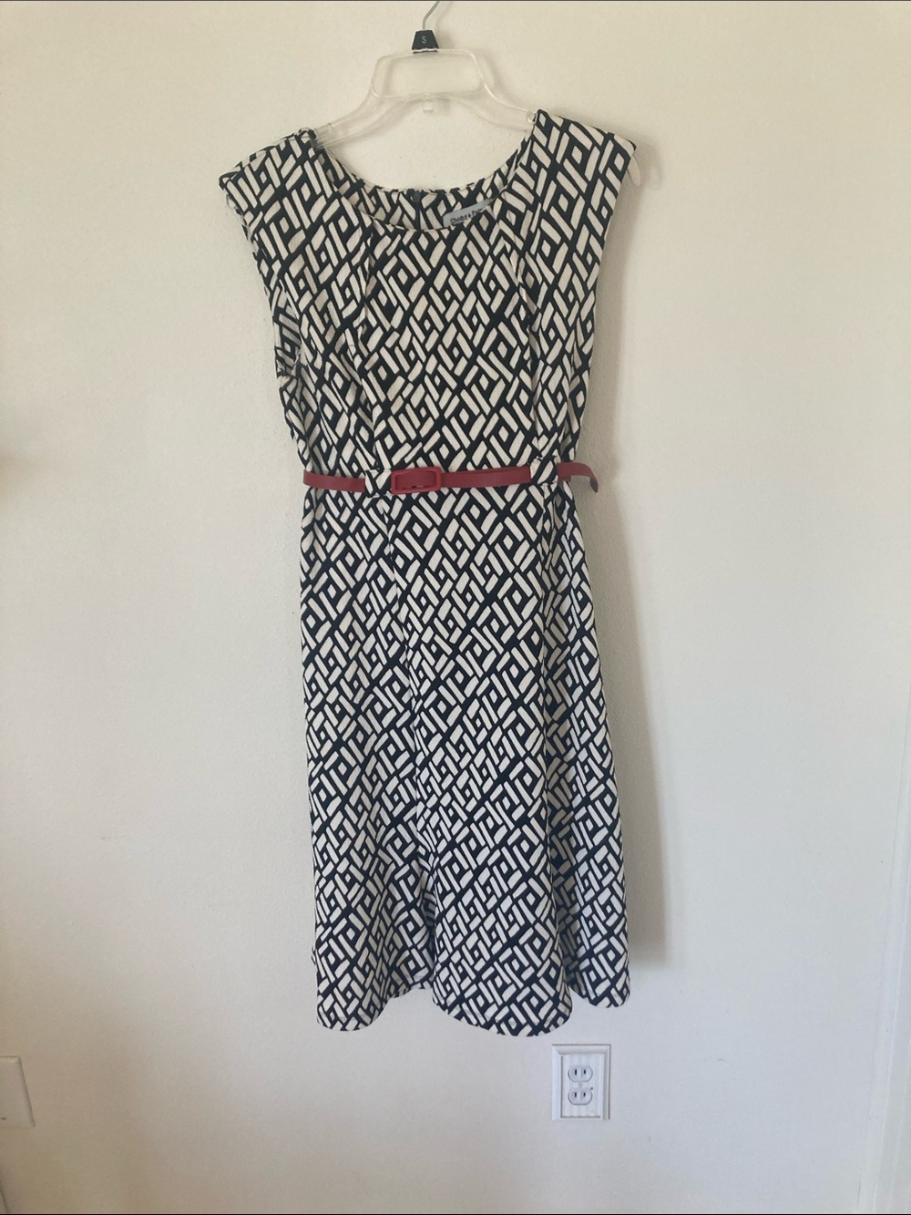 Black and white dress with red belt